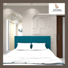 A minimalist bedroom design featuring a clean white wardrobe with an arched detail, complementing the teal headboard.