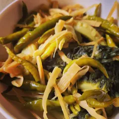 The combination of bitter, spicy, and tangy flavors makes this simple boiled vegetable dish surprisingly complex.