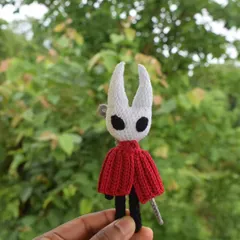 Another angle of the poseable Hornet doll, showing the handmade nail weapon I designed. It was a fun challenge to create my own pattern for the weapon.