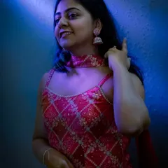 My cinematic photography style in action. I use creative lighting, like this dramatic blue hue, to create moody and artistic portraits that make your event photos look like stills from a movie.