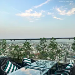 This is the view from Nakshatra, our rooftop restaurant. We've set the table for an unforgettable evening overlooking the city skyline, where the ambiance is as captivating as the cuisine.