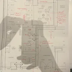A floor plan with notes and markups, showcasing the iterative nature of our design process. Every detail is considered and refined to ensure the final space is both beautiful and perfectly functional.