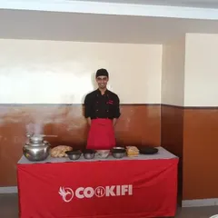 A dedicated live station for preparing hot, steaming dishes right before your guests. This setup is perfect for items like dosas or appams.