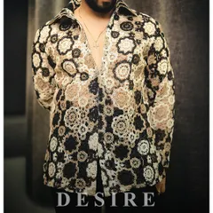 A tapestry of texture. This unique designer shirt features a complex, crochet-like pattern in warm, earthy tones. It is crafted for the fashion-forward man who appreciates artisanal quality and standout style.