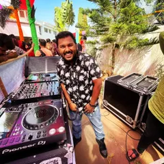 All smiles at a vibrant outdoor day party. I love bringing the energy to daytime events, playing a fun mix of Bollywood, Hip Hop, and Reggae music.
