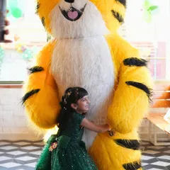 Nothing beats the look of pure joy when a child meets their favorite character. I can arrange for friendly mascots, like this giant cuddly tiger, to visit your party, creating amazing photo opportunities and interactive fun for all the guests.