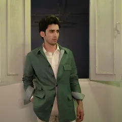 Step into the safari in style with our deep green safari jacket, showcasing Italian elegance at its finest.