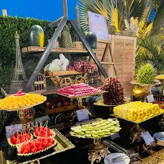 We believe in celebrating nature's sweetness. This spectacular fruit display features an abundant selection of local and exotic fruits, from watermelon and pineapple to grapes and guava, all artfully arranged for a healthy and refreshing option.