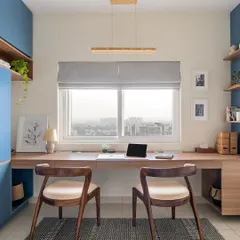 This elaborate study from our 'Living Life in Colours' project was designed for a visiting couple. The long desk provides ample workspace for two, while the blue cabinetry adds a cheerful, energetic vibe.