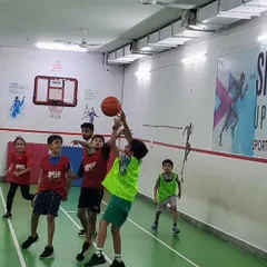 It's game time! Here, our kids learn the fundamentals of basketball, from dribbling and passing to taking their first shot. We focus on participation and teamwork, ensuring everyone gets a chance to play and feel like part of the team.