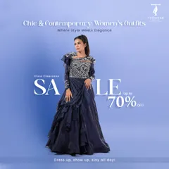 This chic and contemporary navy blue gown is perfect for any formal event. The bodice is intricately detailed with silver embroidery, and the flowing ruffled skirt adds a touch of elegance and movement.