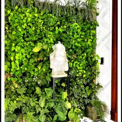 For those who want a truly living piece of art, I create thriving bio-walls like this one. The dense, real foliage not only looks beautiful but also helps purify the air, and the serene Buddha statue adds a touch of tranquility.