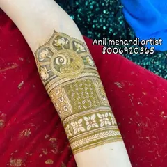 Another view of the peacock armband, this time with an added geometric band below it. I can customize the length and complexity to your liking.