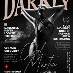 A cover for Darkly Magazine from the "Elegy in Motion" series. Black and white photography strips everything down to emotion and form. This shot captures a moment of tension and release, turning the model into a living sculpture draped in shadow.