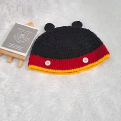 Instantly recognizable, this Mickey Mouse-inspired beanie is perfect for any little Disney fan, complete with the iconic ears and button details.
