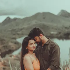A quiet moment of connection with the mountains as a witness. We love taking couples to serene, natural settings for their pre-wedding photography, letting the landscape amplify their love story.
