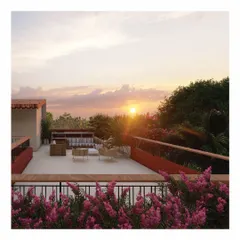 Of evening sunsets, coffee, and bougainvilleas. This render shows the terrace of 'The Red Haus', a space designed to bring people together. The design focuses on creating picturesque moments and framing the beautiful natural surroundings.
