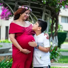A touching moment between a mother-to-be and her son, who is about to become a big brother. Outdoor sessions like this are perfect for capturing the evolving story of a growing family.