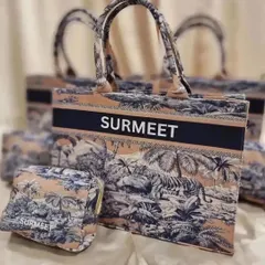 A close-up of the personalised tote bag and matching pouch from our anniversary gift set.