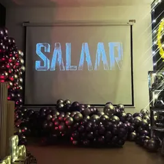 The title 'SALAAR' displayed boldly on our 135-inch screen. Get the full cinematic experience for the biggest blockbusters with your gang.