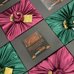 For this corporate order for Workshaala, I combined elegant black boxes with rich satin-wrapped gifts inside. Each box was finished with a custom-branded Diwali card, creating a sophisticated and memorable gift for their team.