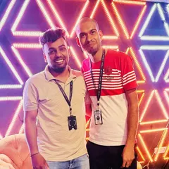 Posing with a team member during his work anniversary celebration. We foster a positive and supportive environment where every individual's contribution is recognized.