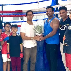 Our students and coaches felicitating our founder, Mr. Devraj Das. We are a team that celebrates each other's successes.
