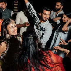 The bride Mouni Roy and her friend, actor Arjun Bijlani, dancing the night away at her Mehendi. I love playing for celebrity weddings and bringing that star-quality energy.