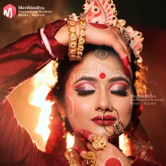 A close-up of the traditional Bengali bridal makeup. Our courses cover regional bridal looks, focusing on details like the Chandan art, bold eyes, and flawless base.