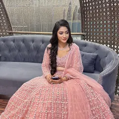 This client chose a gorgeous pink lehenga for her engagement. I designed a soft glam look with a focus on glowing skin and pink tones to match her outfit perfectly.