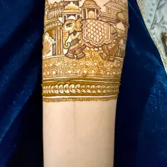 The elephant procession armband with more detail and shading added. The fine lines and patterns create a rich and textured look.