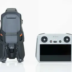 The DJI Mavic 3 drone in its compact, folded state next to the smart controller. This professional setup is portable and efficient, allowing for quick deployment at event locations across Bengaluru.