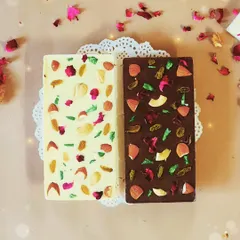 Our Shahi Gulkand white chocolate bar and Almond Scotch dark chocolate bar are Diwali favorites. They are loaded with nuts and rose petals, offering a rich and aromatic flavor in every bite.