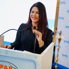 Speaking from the podium at the Elpis Auto meet. I deliver key messages with clarity while keeping the event engaging.