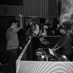 Making the night unforgettable, the retro way. Here you can see guests enjoying the music right by the DJ console.