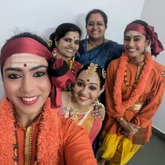 Celebrating an award for my research paper with my students who performed with me. Research is never individual work; it's an assimilation of knowledge from gurus, scholars, and the artists I work with.
