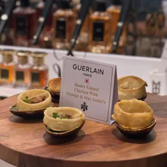It was a pleasure to design a bespoke menu for a luxury event with Guerlain. This canapé features honey-glazed chicken with orange and star anise, a bite-sized taste of French-inspired elegance.