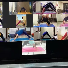 We are all in Adho Mukha Svanasana, or Downward Dog, together. This pose is fantastic for grounding and improving blood circulation. Working together as a community, even virtually, brings a sense of harmony and shared success.