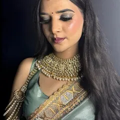 A close-up of the airbrush makeup, showing how it provides excellent coverage while still looking natural and skin-like. Our students learn this for high-definition results.
