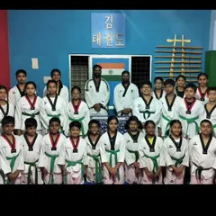 A group photo of our students in the dojang. We are a team, a family of martial artists dedicated to the principles of Taekwondo.