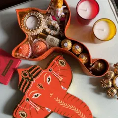 A still photo of the Ganesha-shaped hamper, perfect for celebrating the festival. The box itself is a keepsake.
