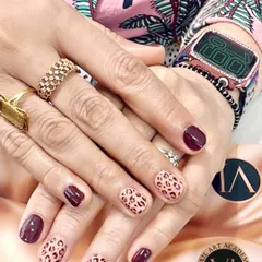 A classic with a twist. We teach how to create a perfect, crisp leopard print and pair it with a rich wine red for a bold and classy look.