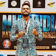 Meet Suraj, our Silver medalist in the Men's Bantamweight division. An IT project manager by profession, he proves that passion and dedication have no age limit.