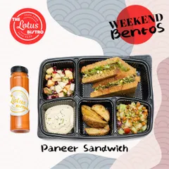 Our Paneer Sandwich Bento is a great vegetarian alternative to our curry boxes. It features a sandwich with a savory paneer filling, paired with potato wedges, a fresh salad, and hummus.