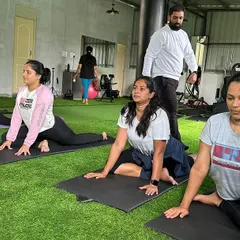 Celebrating International Yoga Day on our turf area. We provide a dedicated space for activities like yoga and stretching, ensuring a well-rounded fitness experience.