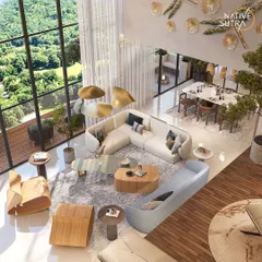 An aerial perspective of a double-height living room that opens onto a spacious balcony. The design uses organic shapes in the furniture and a nature-inspired wall installation to echo the lush green landscape visible through the floor-to-ceiling windows.