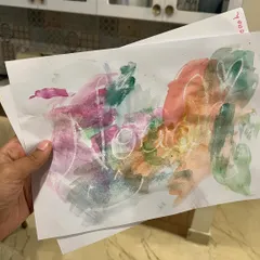 The magic of reveal art! We draw with a white wax crayon, and then the toddlers paint over it with watercolors to magically reveal the hidden picture.