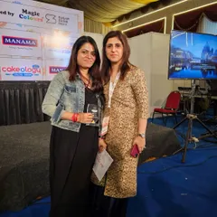 Posing with one of the esteemed judges, holding my award. These moments are a powerful validation of the passion and dedication I pour into my baking.