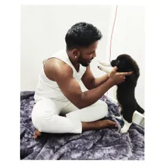 A personal moment playing with a young puppy. This is more than a business for me, it's my life.