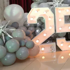 Large marquee numbers, here showing '25', are perfect for celebrating a milestone anniversary like a silver jubilee.